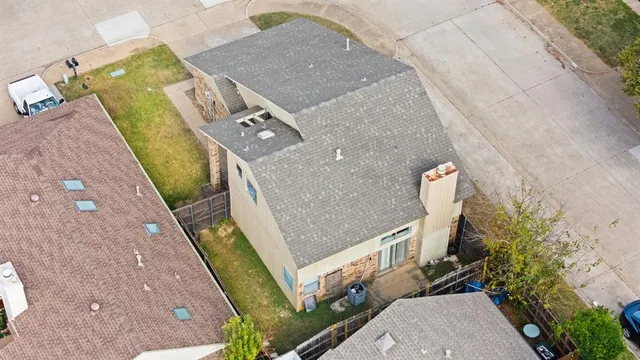 an aerial view of residential building and parking space