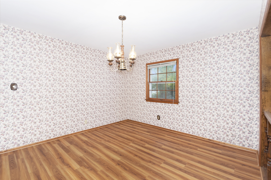 11 Woodcliff Road Montgomery, IL 60538 - Photo 8 of 18 a view of empty room with a window
