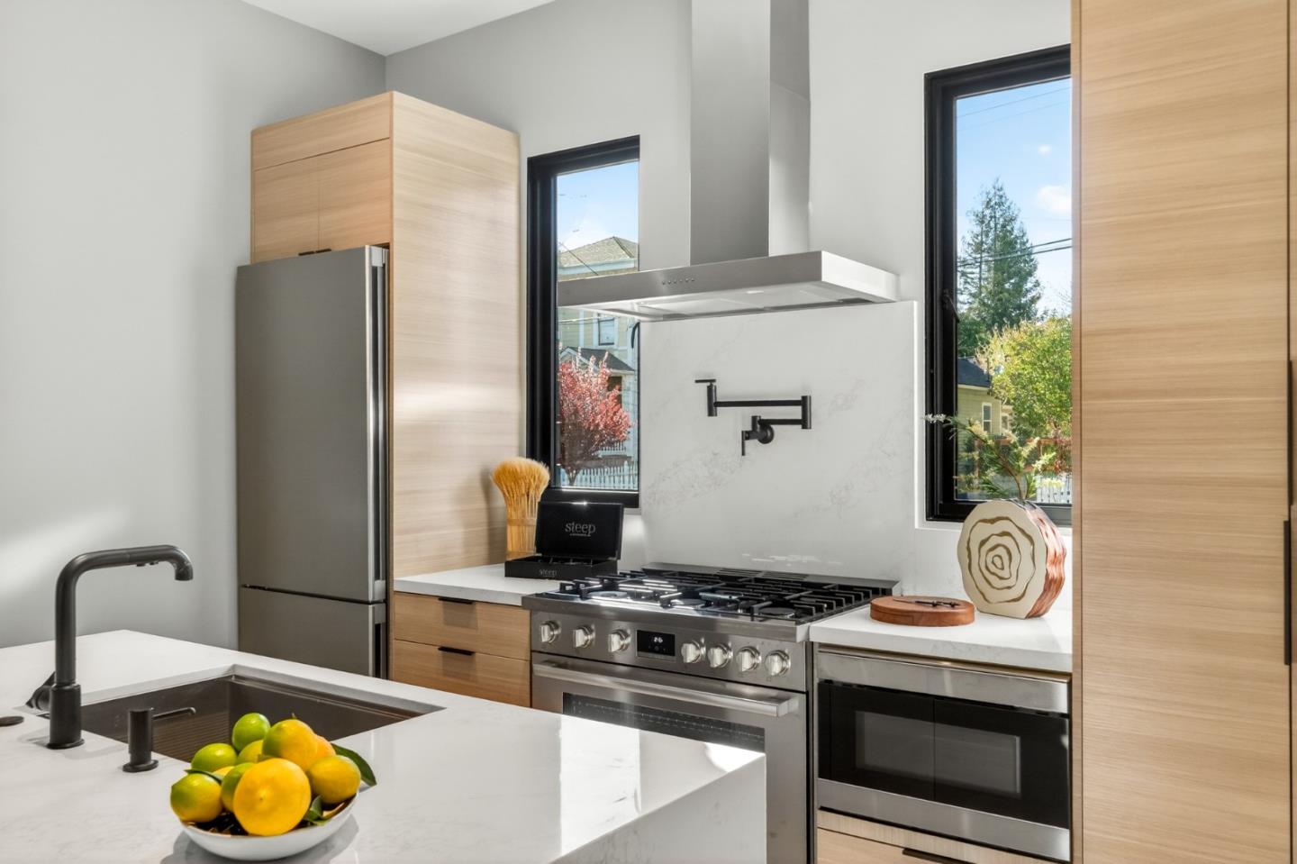 585 Riverside Drive Napa, CA 94559 - Photo 15 of 36 a kitchen with a stove and a wooden floor