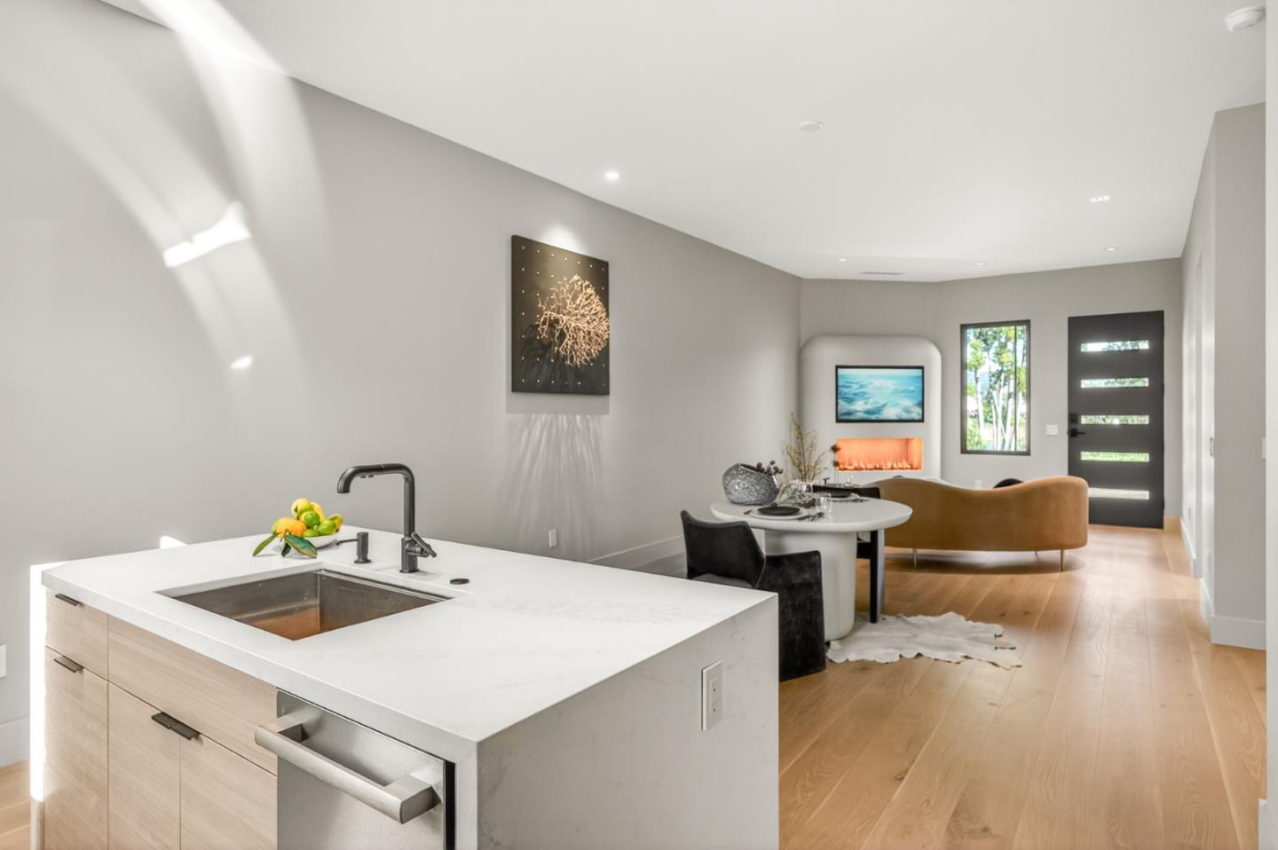 585 Riverside Drive Napa, CA 94559 - Photo 16 of 36 a kitchen with a stove a refrigerator and a dining table with wooden floor