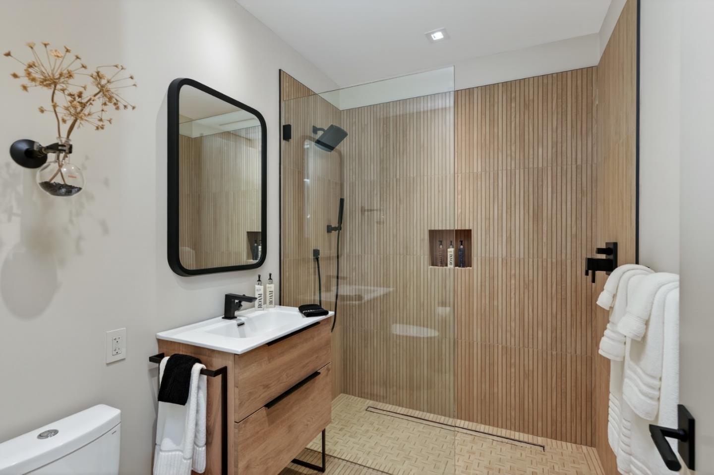 585 Riverside Drive Napa, CA 94559 - Photo 22 of 36 a bathroom with a sink a toilet and shower