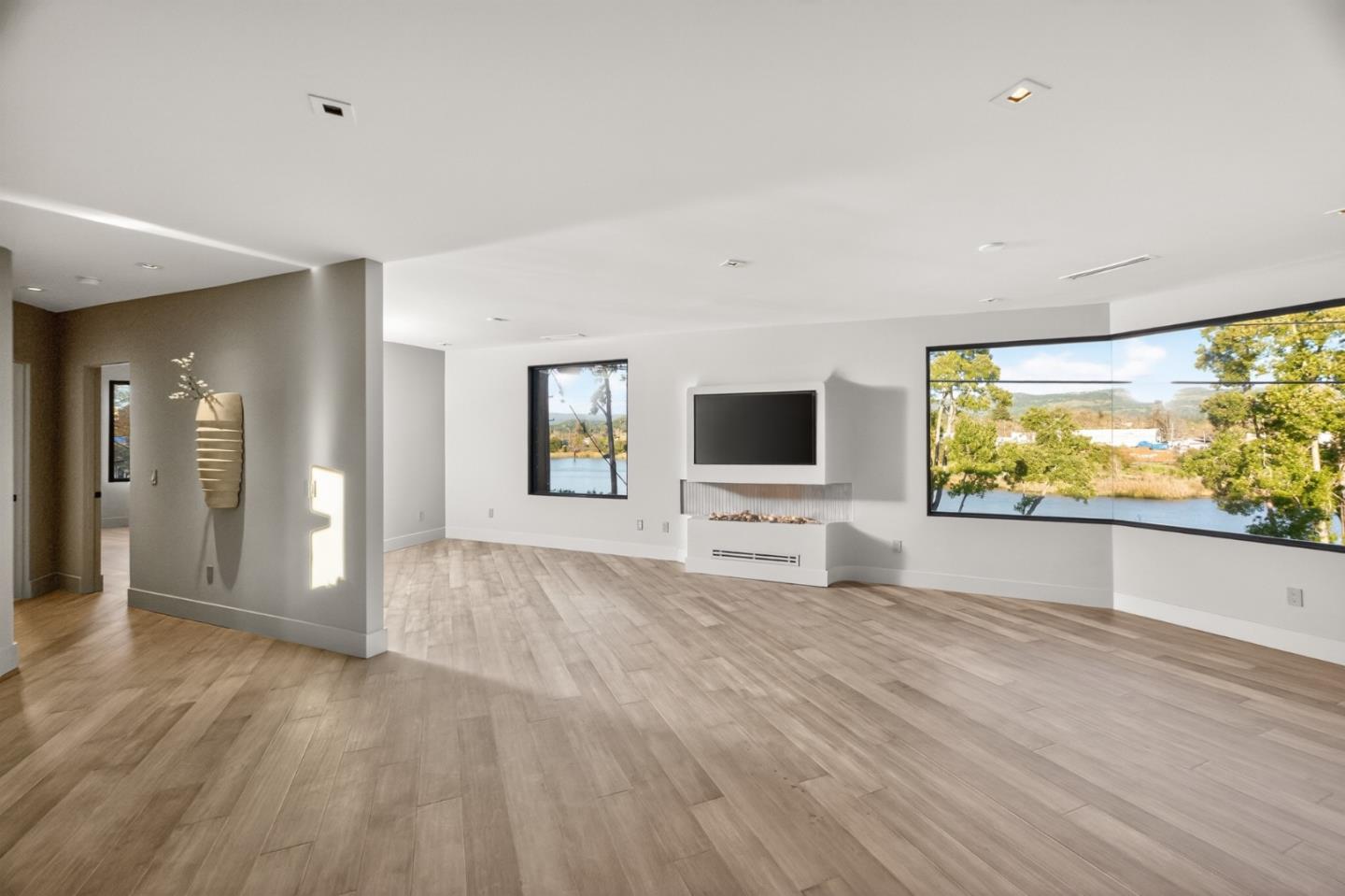 585 Riverside Drive Napa, CA 94559 - Photo 24 of 36 a view of a livingroom with wooden floor and furniture