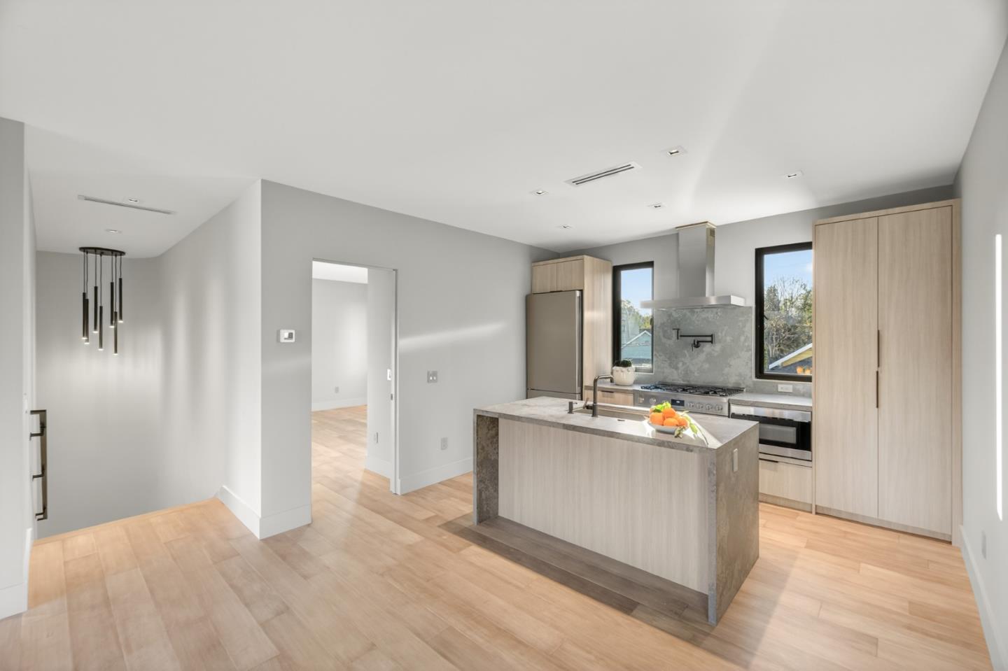 585 Riverside Drive Napa, CA 94559 - Photo 28 of 36 a living room with stainless steel appliances kitchen island granite countertop furniture and a refrigerator