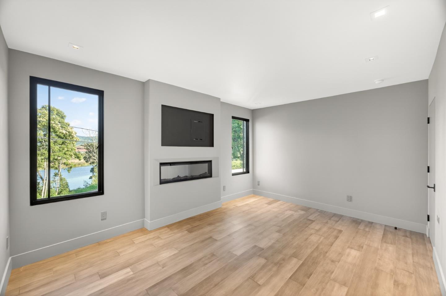 585 Riverside Drive Napa, CA 94559 - Photo 30 of 36 a view of empty room with wooden floor and fan