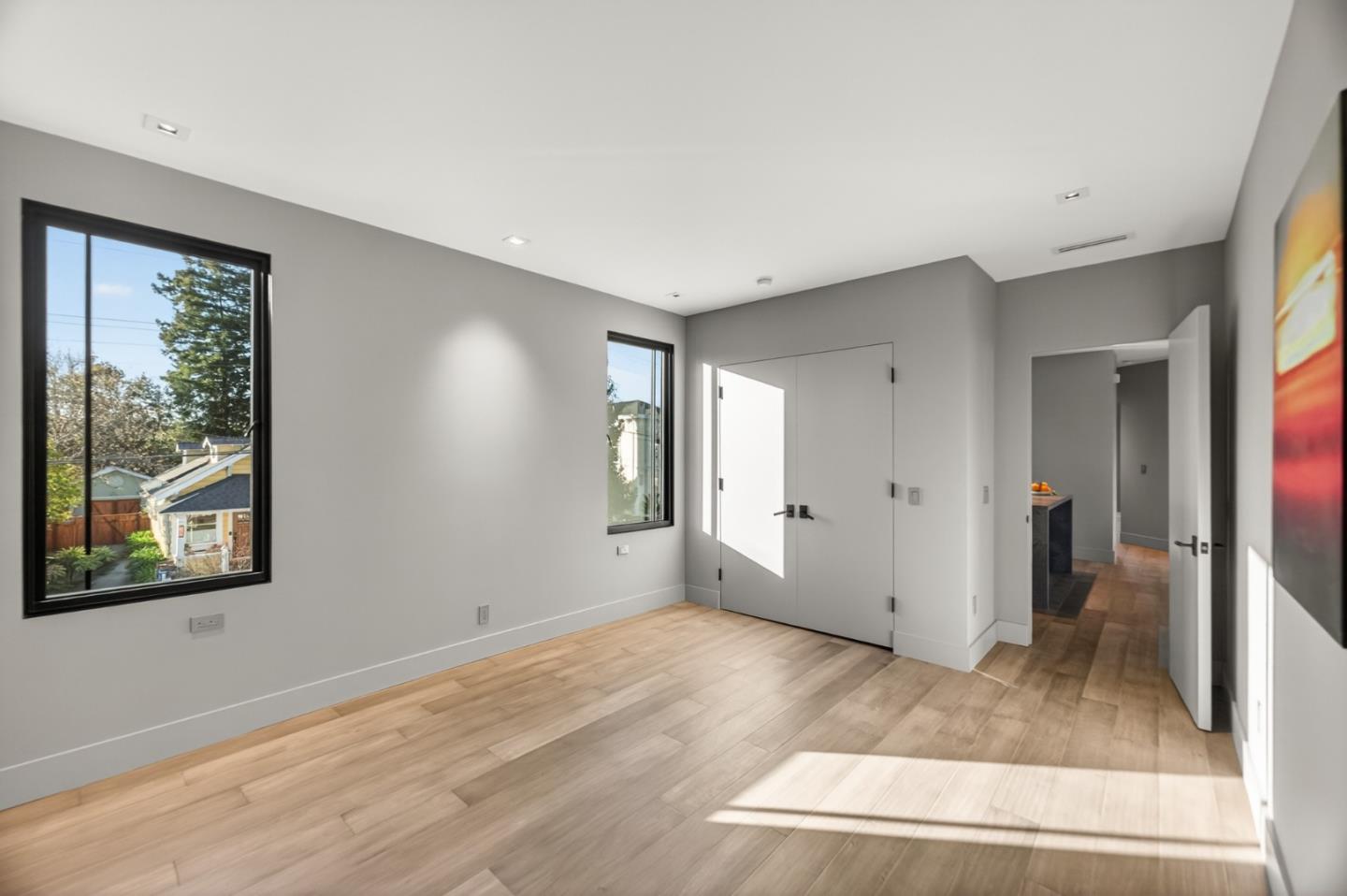 585 Riverside Drive Napa, CA 94559 - Photo 32 of 36 an empty room with wooden floor and windows