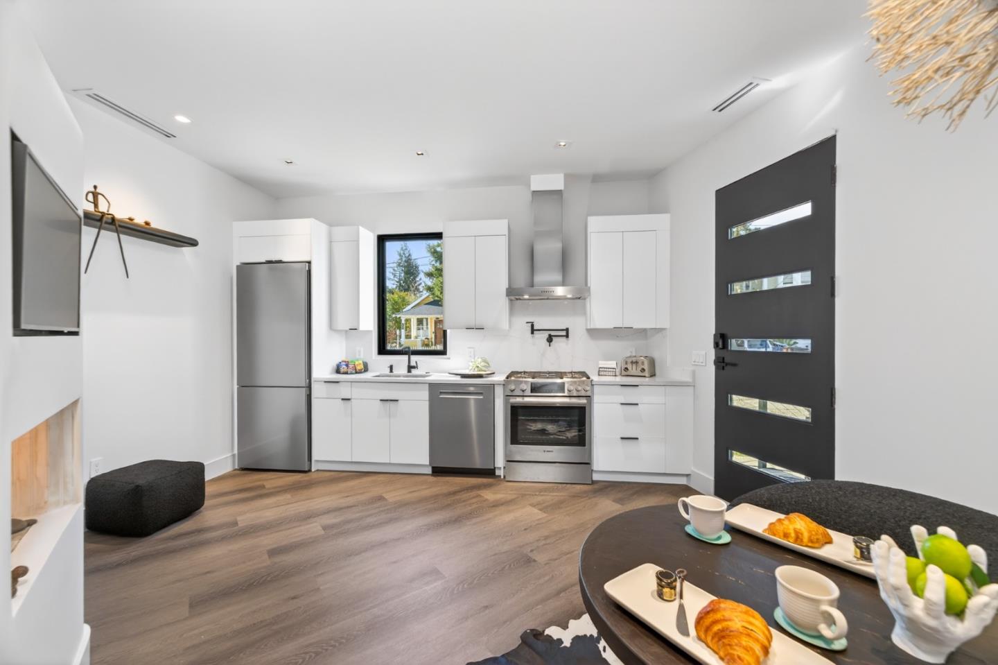 585 Riverside Drive Napa, CA 94559 - Photo 8 of 36 a kitchen with a refrigerator and a stove top oven