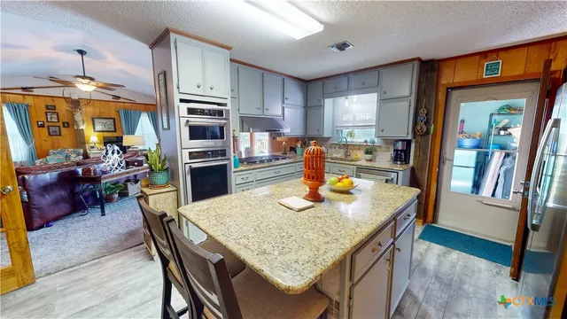 a en suite bathroom with sink and mirror