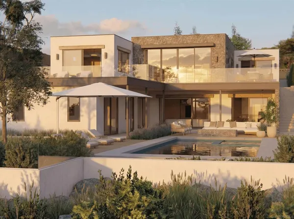 a front view of a house with swimming pool and porch