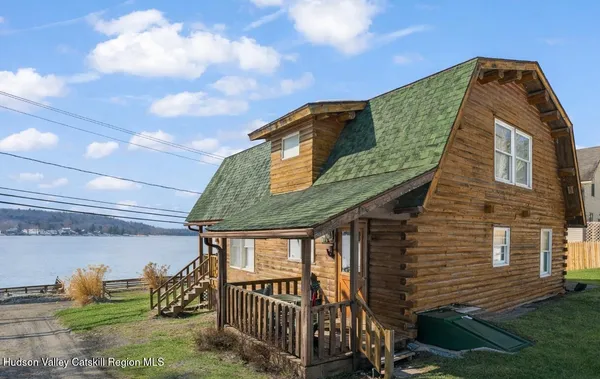 a kitchen with a stove a sink and a refrigerator