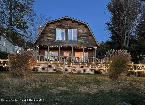 a large kitchen with stainless steel appliances granite countertop a sink stove and refrigerator