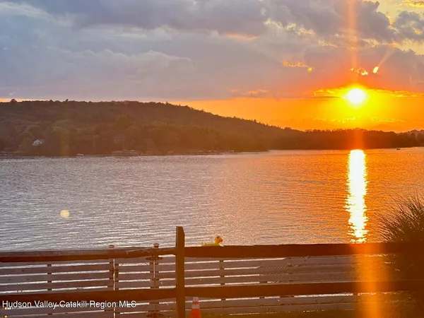 a utility room with sink dryer and washer