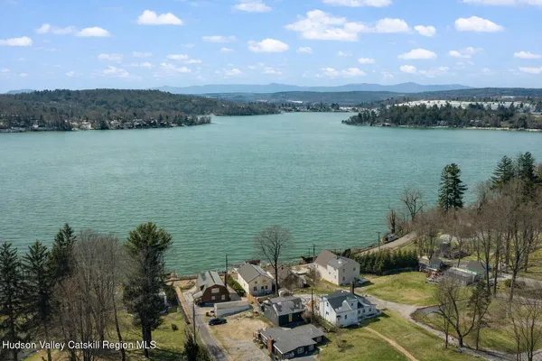 a view of swimming pool with seating area