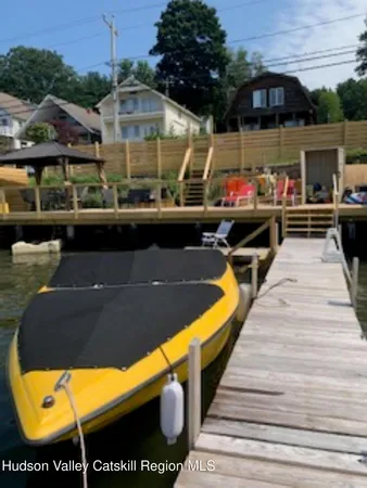 a living room with furniture flat screen tv and a fireplace