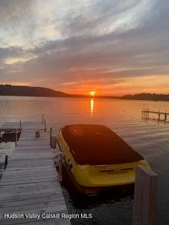 a view of a porch with wooden floor