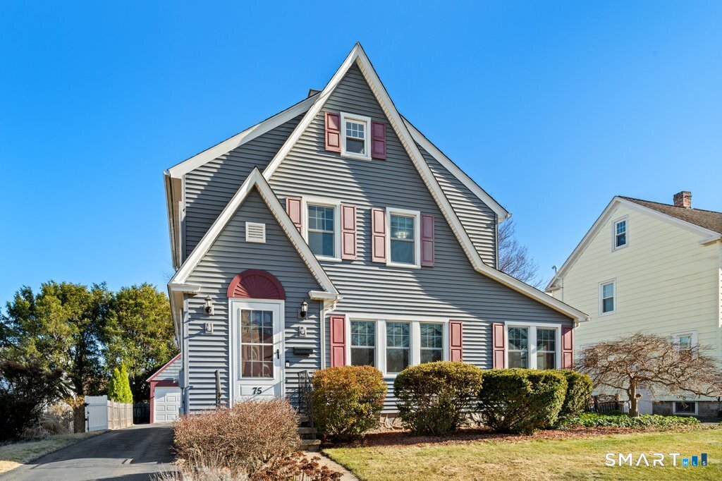 75 Elizabeth Terrace Stratford, CT 06614 - Photo 1 of 38 a front view of a house with a yard