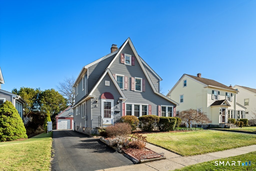 75 Elizabeth Terrace Stratford, CT 06614 - Photo 2 of 38 a front view of a house with a yard