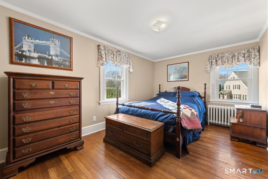75 Elizabeth Terrace Stratford, CT 06614 - Photo 25 of 38 a bedroom with a bed and a window