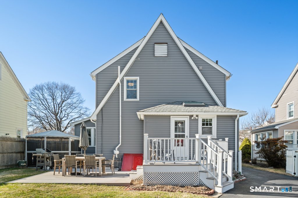 75 Elizabeth Terrace Stratford, CT 06614 - Photo 3 of 38 a front view of a house with a yard