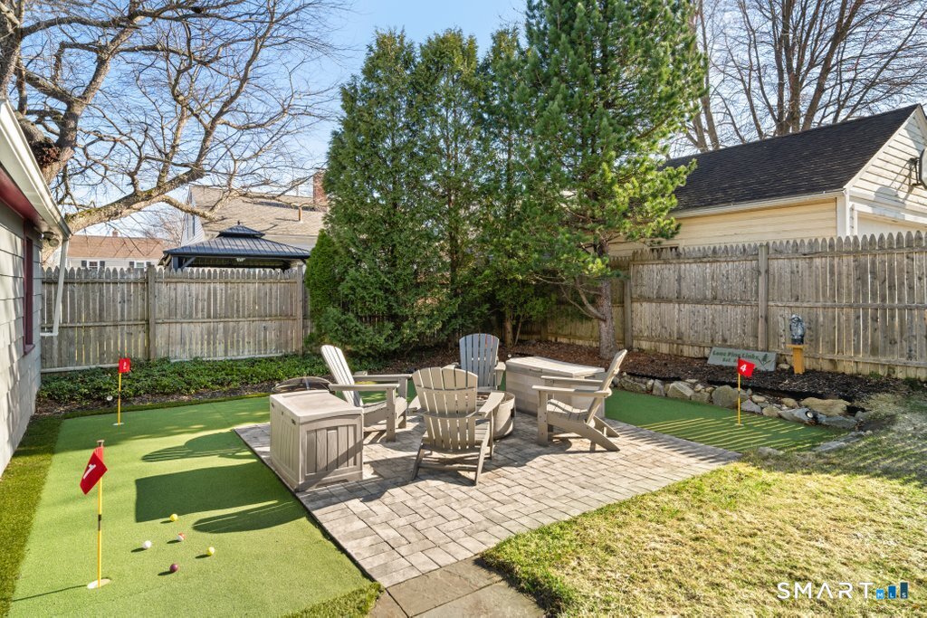 75 Elizabeth Terrace Stratford, CT 06614 - Photo 4 of 38 a view of backyard with swimming pool and outdoor seating