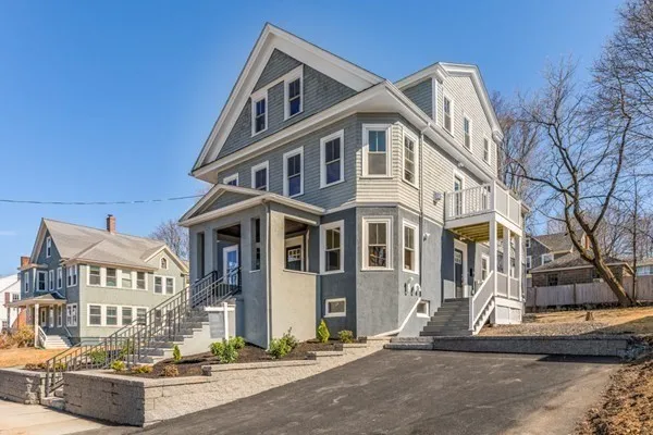 a front view of a multi story residential apartment building