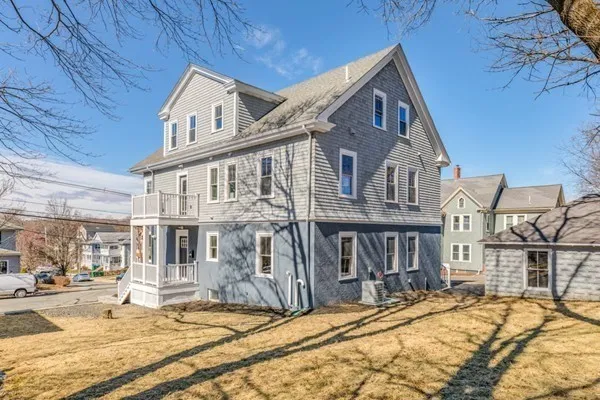 a front view of a house with a patio