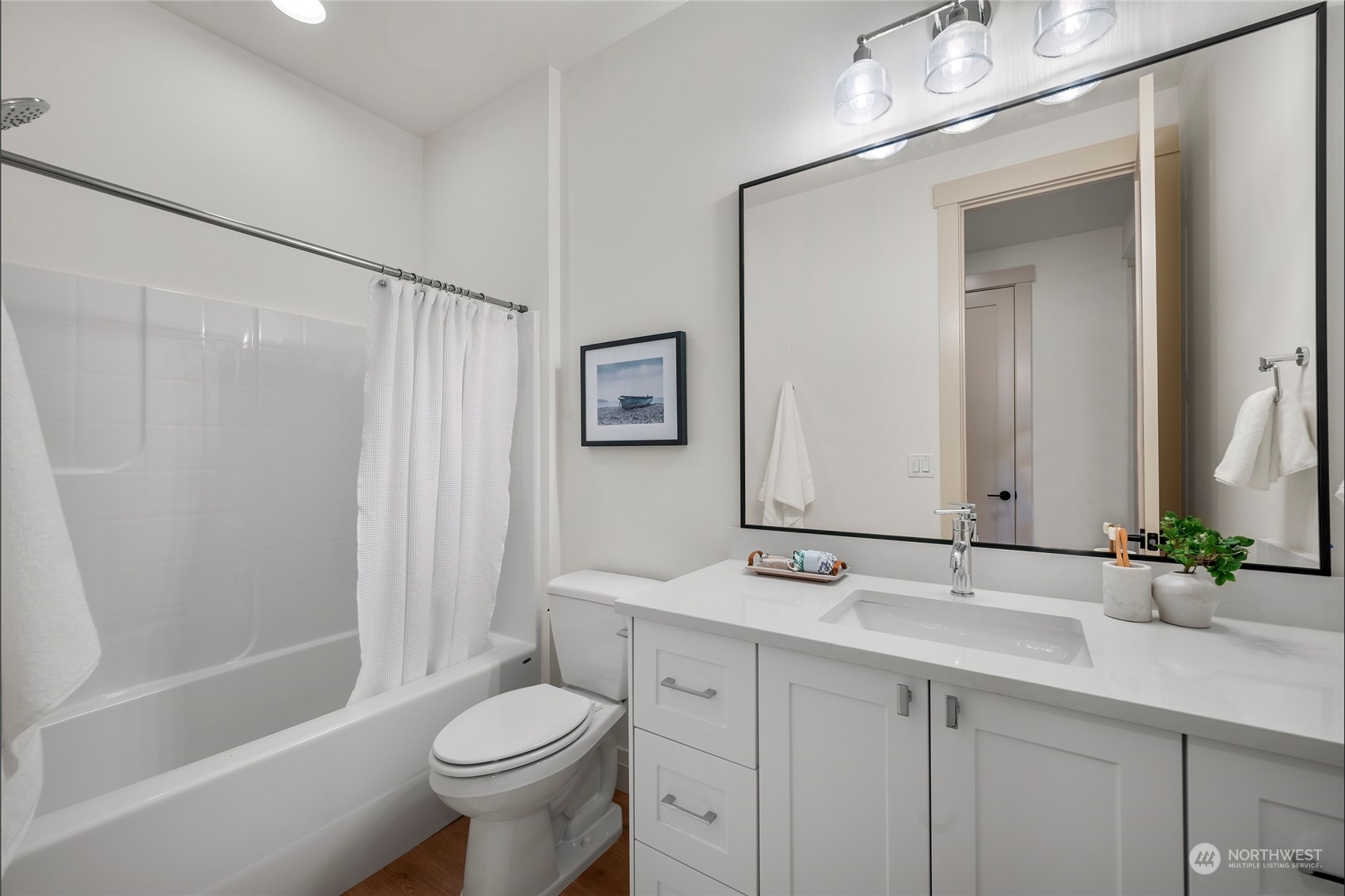 316 174th Street Southeast Bothell, WA 98012 - Photo 30 of 36 a bathroom with a sink a toilet and shower