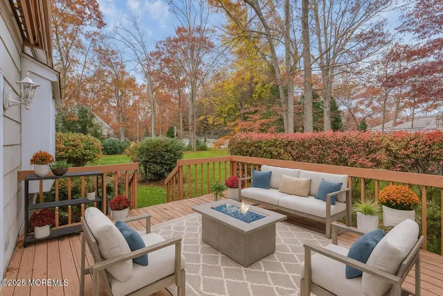 a view of an outdoor sitting area with furniture