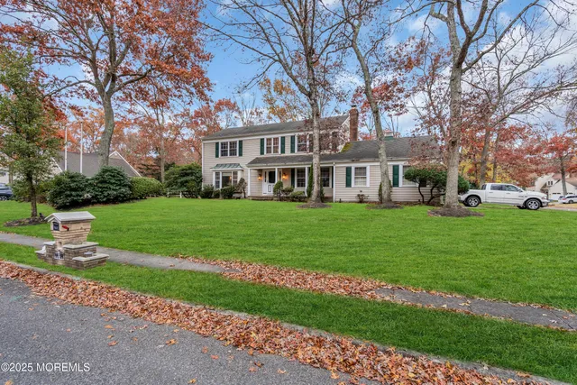 a front view of a building with garden