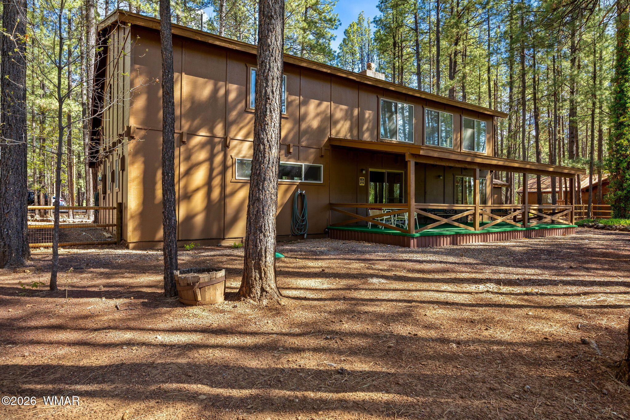 7456 Geronimo Road Pinetop, AZ 85935 - Photo 28 of 35 a view of a house with a street