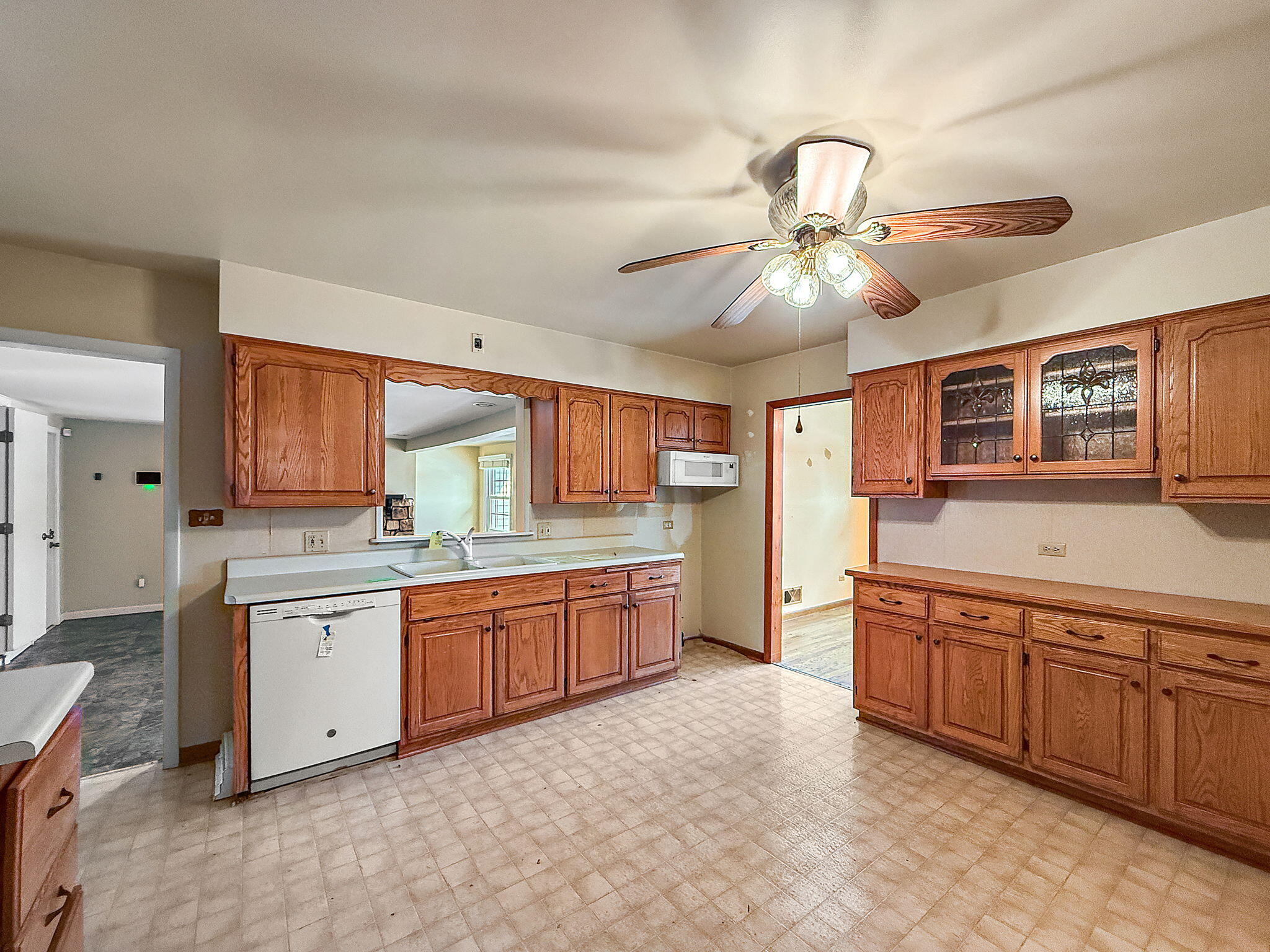 3339 Wirth Road Highland, IN 46322 - Photo 14 of 29 a large kitchen with stainless steel appliances granite countertop a sink and cabinets