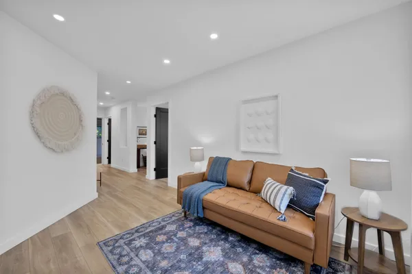 a living room with furniture and a couch