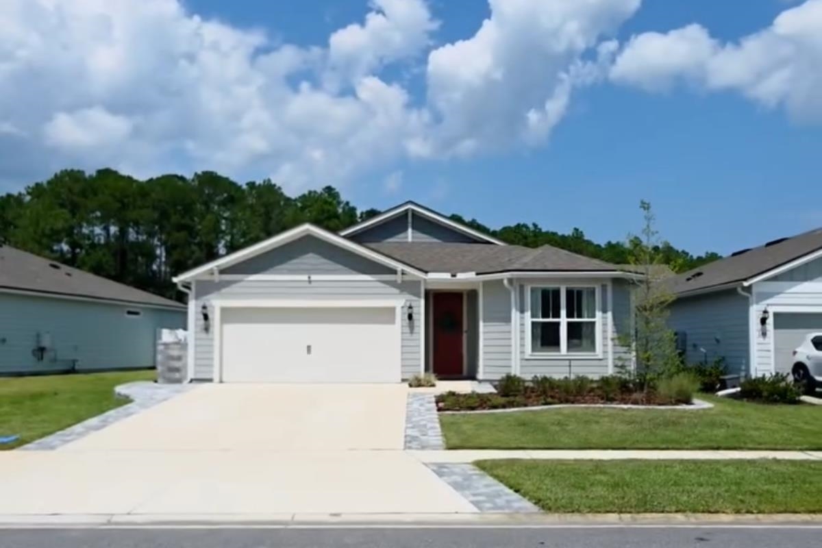 196 Red Barn Rd Street St. Augustine, FL 32092 - Photo 29 of 53 a view of a house with a yard