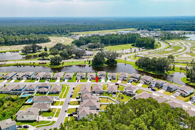 a view of a swimming pool with a chair
