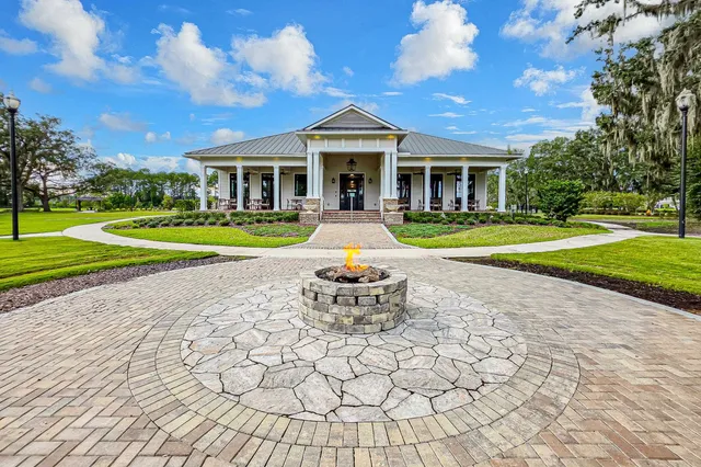 a view of a house with a park
