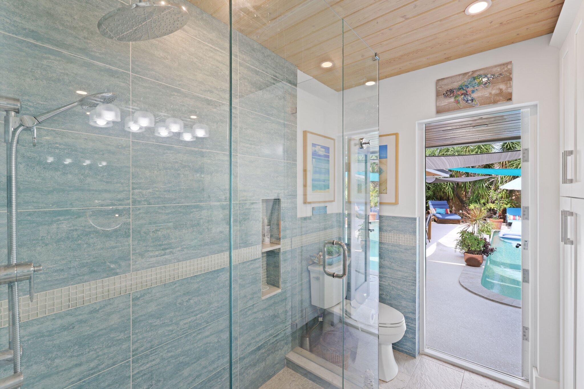 784 Dover Street Boca Raton, FL 33487 - Photo 29 of 78 a bathroom with a shower and toilet