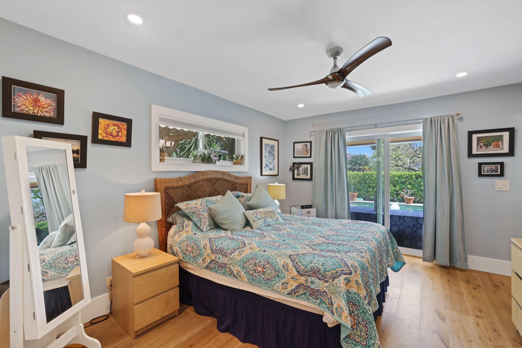 784 Dover Street Boca Raton, FL 33487 - Photo 30 of 78 a bedroom with a large bed and a window