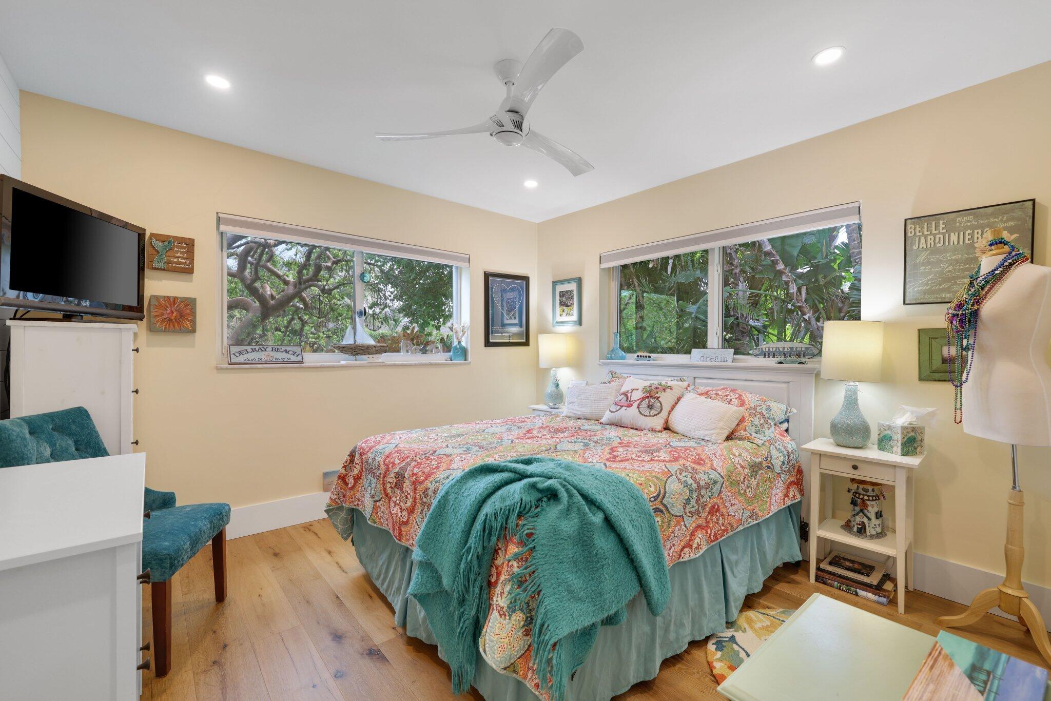 784 Dover Street Boca Raton, FL 33487 - Photo 38 of 78 a bedroom with a bed window and a flat screen tv