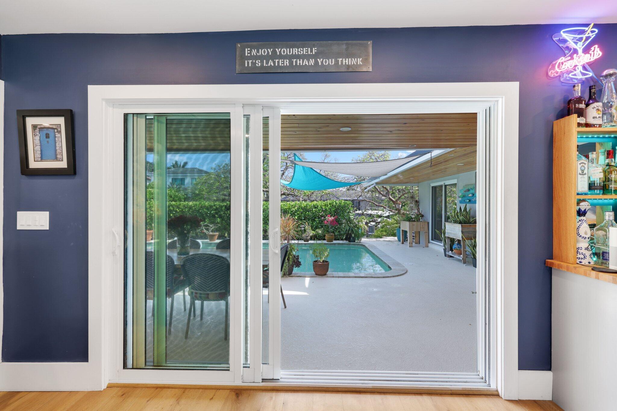 784 Dover Street Boca Raton, FL 33487 - Photo 44 of 78 a view of a brick house with a large window