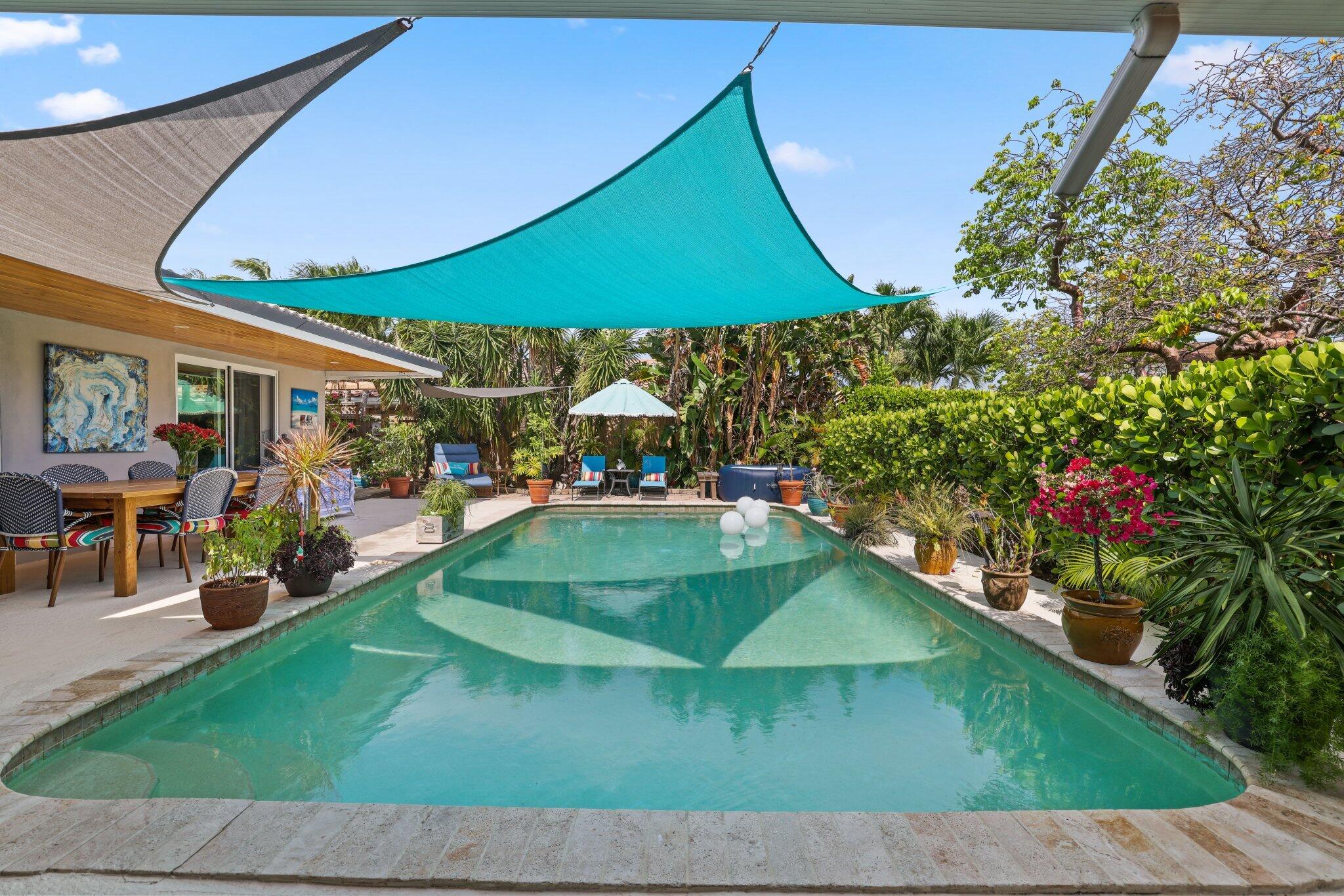 784 Dover Street Boca Raton, FL 33487 - Photo 46 of 78 an outdoor space with lots of potted plants