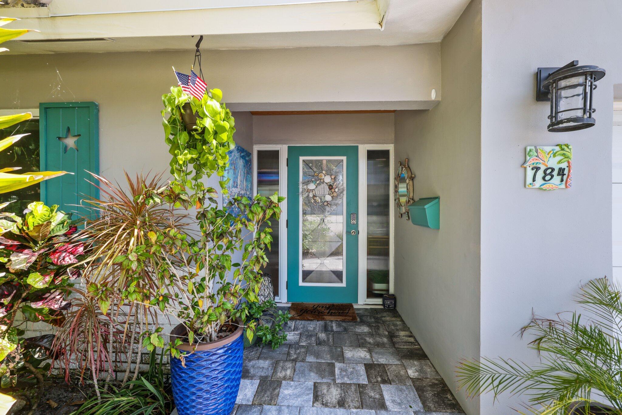 784 Dover Street Boca Raton, FL 33487 - Photo 5 of 78 a front view of a house