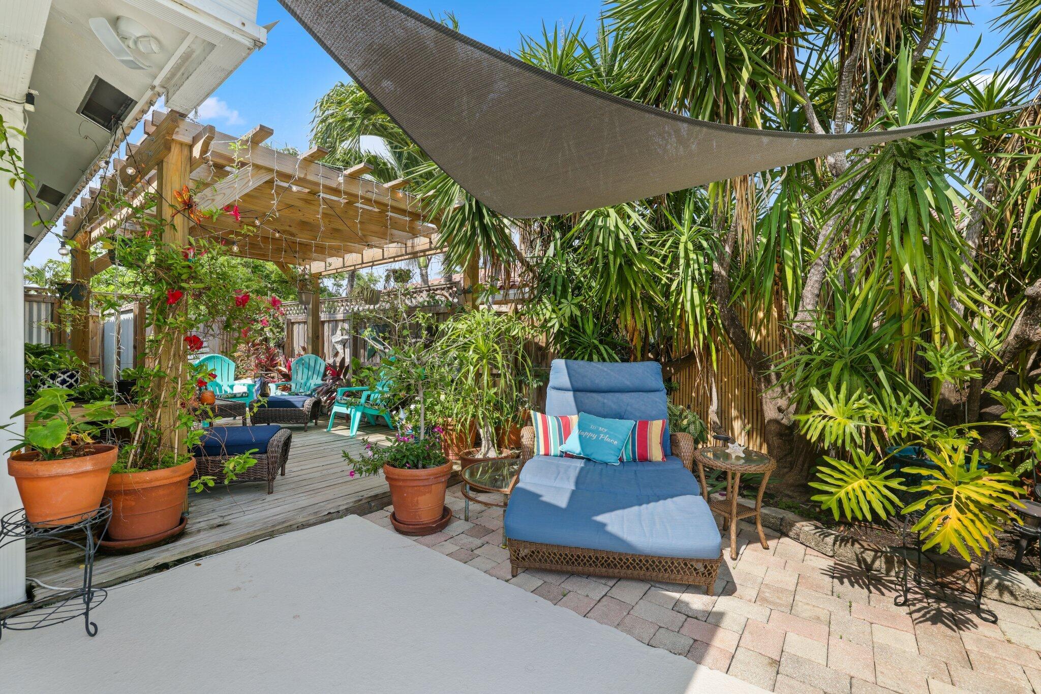 784 Dover Street Boca Raton, FL 33487 - Photo 54 of 78 a view of a chairs and table in a patio