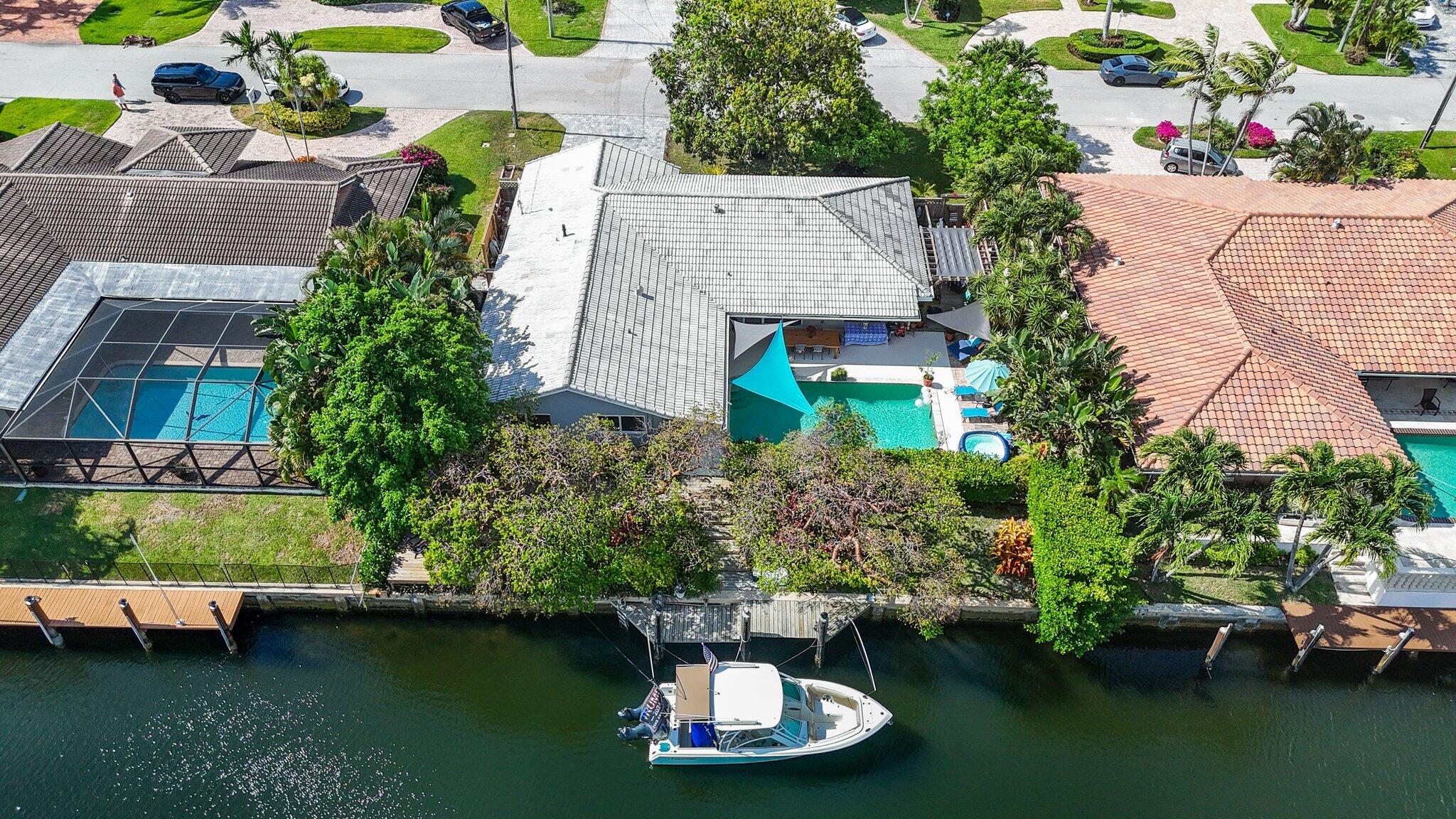 784 Dover Street Boca Raton, FL 33487 - Photo 64 of 78 an aerial view of a house with swimming pool patio and outdoor seating