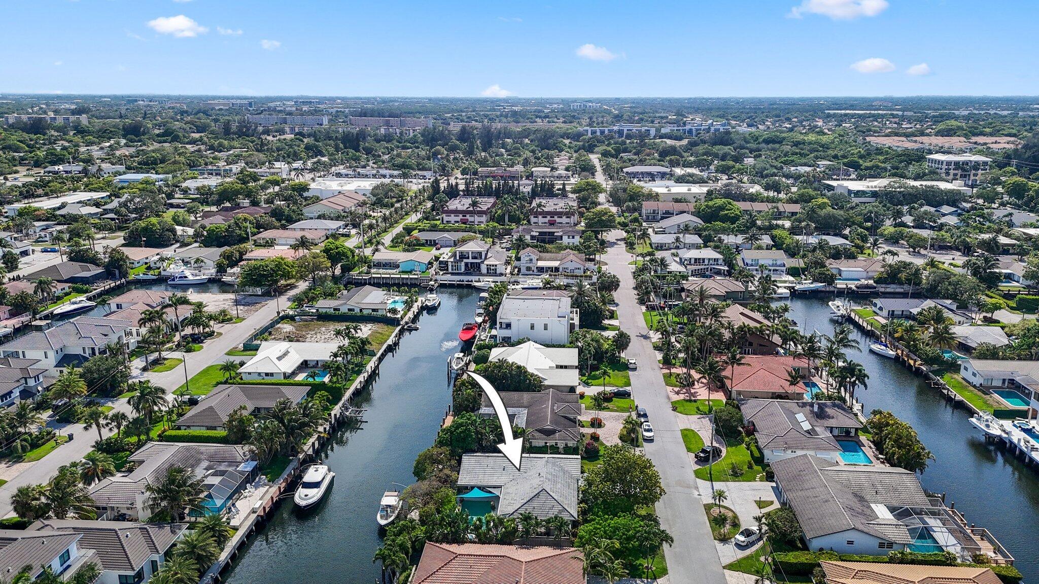 784 Dover Street Boca Raton, FL 33487 - Photo 65 of 78 an aerial view of a city with lots of residential buildings