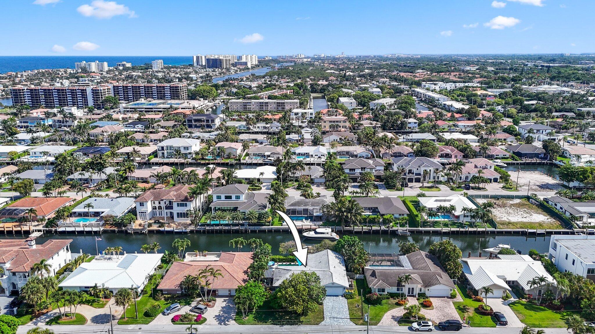 784 Dover Street Boca Raton, FL 33487 - Photo 66 of 78 an aerial view of lake and residential houses with outdoor space