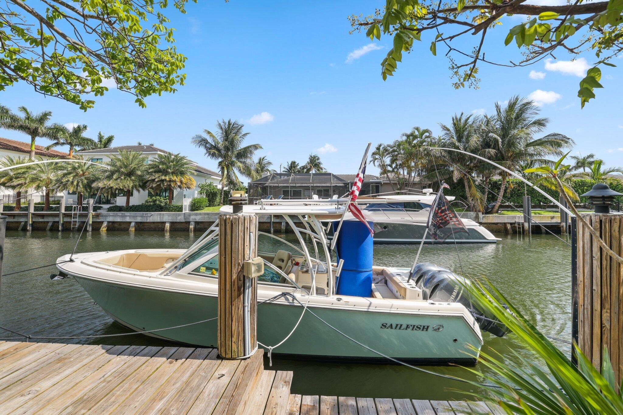 784 Dover Street Boca Raton, FL 33487 - Photo 76 of 78 a view of a swimming pool with a lake view