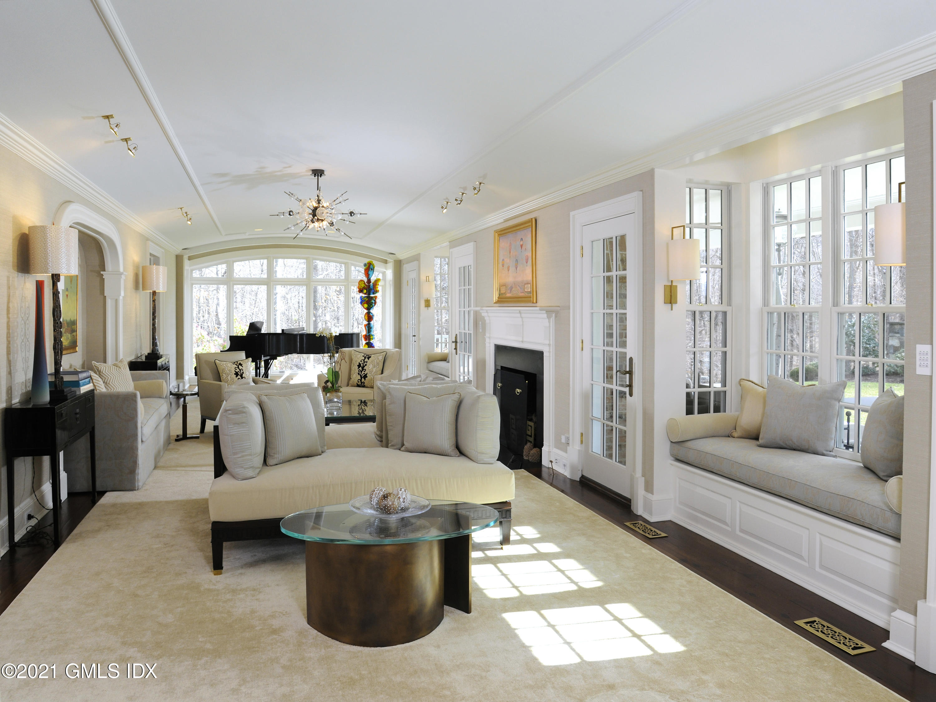 74 Upper Cross Road Greenwich, CT 06831 - Photo 11 of 40 a living room with furniture and a fireplace