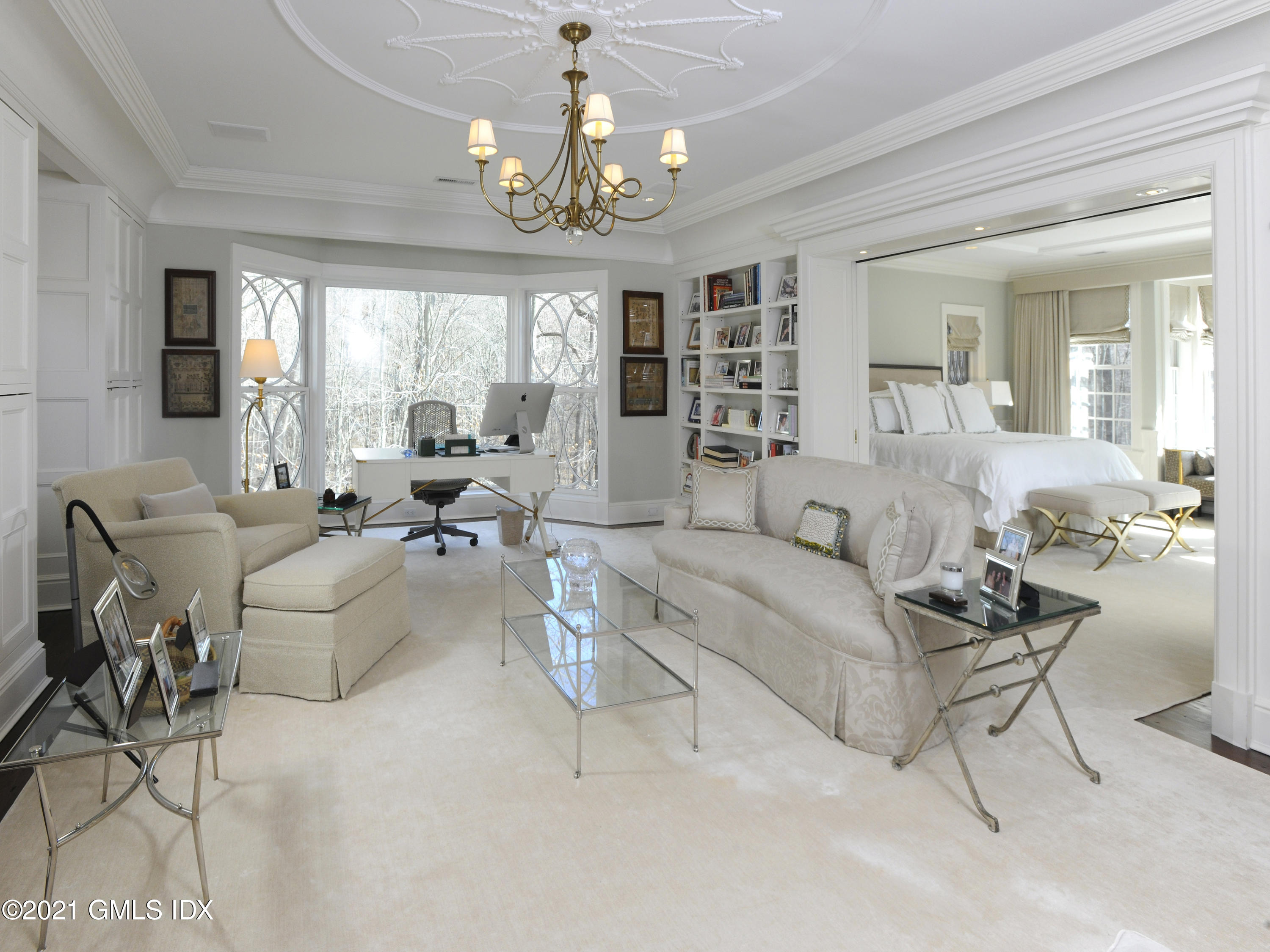 74 Upper Cross Road Greenwich, CT 06831 - Photo 22 of 40 a living room with furniture and a chandelier