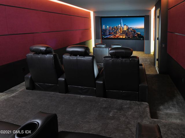 a room with furniture and a flat screen tv