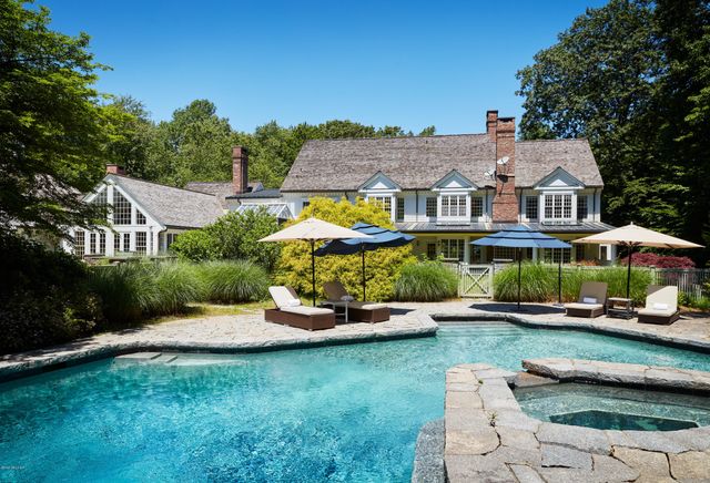 an aerial view of a house with a garden view