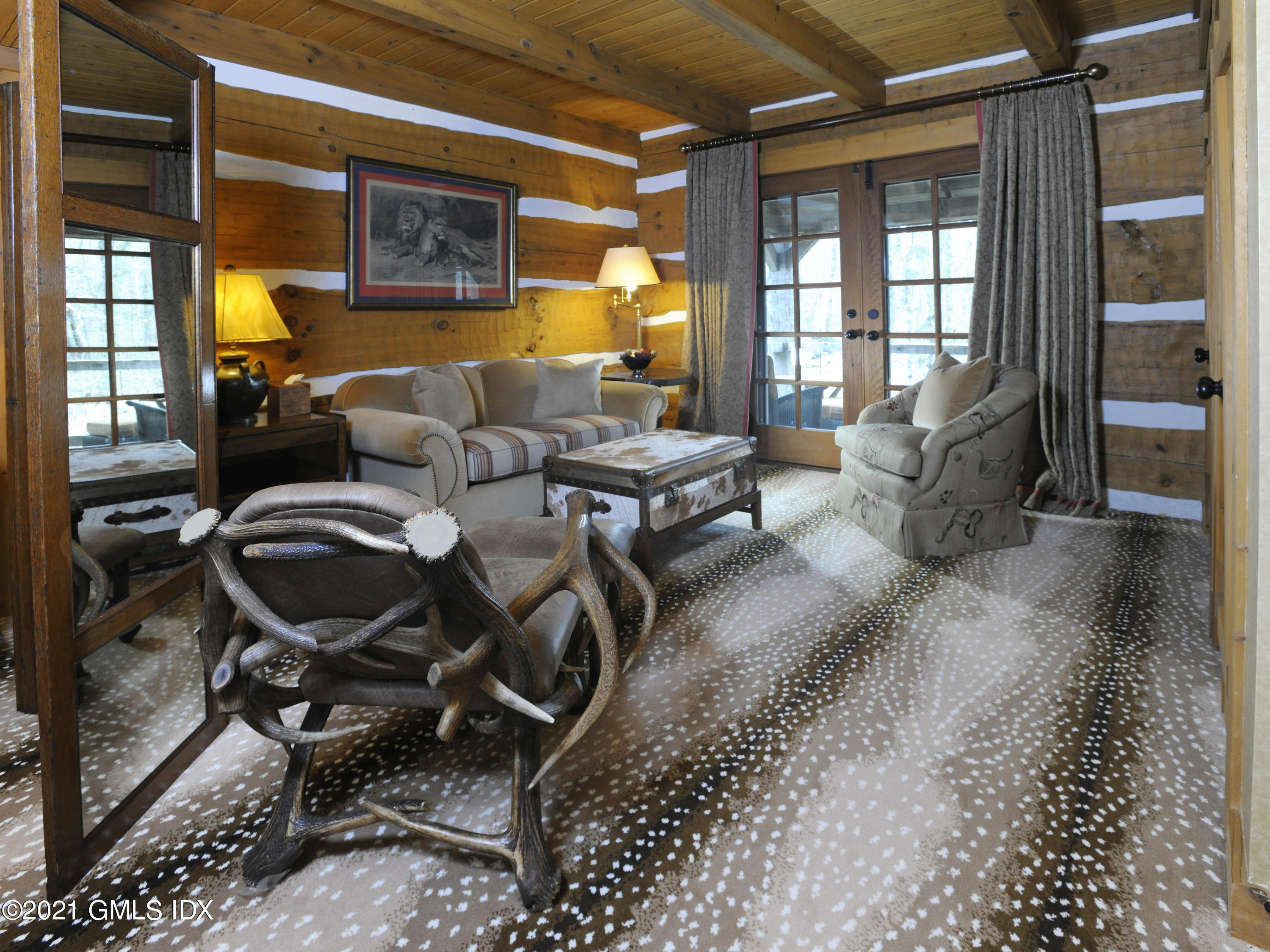 74 Upper Cross Road Greenwich, CT 06831 - Photo 34 of 40 a living room filled with furniture